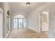 Bright sunroom with hardwood floors and stained glass windows at 315 W 2Nd St, Cherryville, NC 28021