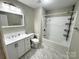 Modern bathroom showcasing a tiled shower and flooring, plus a stylish vanity and mirror at 3153 Wimbledon Ln, Rock Hill, SC 29732