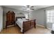 Bedroom featuring a wood sleigh bed, hardwood floors, and natural light at 3153 Wimbledon Ln, Rock Hill, SC 29732