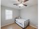 Bedroom with a ceiling fan, hardwood floors and a sunny window that allows lots of natural light at 3153 Wimbledon Ln, Rock Hill, SC 29732