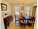 Dining room with wood floors, chandelier and large windows at 3153 Wimbledon Ln, Rock Hill, SC 29732