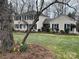 Charming two-story home featuring a well-manicured front lawn and classic design at 3153 Wimbledon Ln, Rock Hill, SC 29732