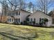 Beige two-story home with dark shutters and verdant lawn at 3153 Wimbledon Ln, Rock Hill, SC 29732