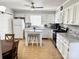 Bright and airy kitchen with white cabinets, butcher block island, and updated appliances at 3153 Wimbledon Ln, Rock Hill, SC 29732