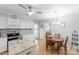 Eat-in kitchen with stainless steel appliances, a center island, and a wooden dining table at 3153 Wimbledon Ln, Rock Hill, SC 29732