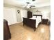 Spacious main bedroom featuring hardwood floors, ceiling fan and dark wood furniture at 3153 Wimbledon Ln, Rock Hill, SC 29732