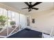 Cozy screened-in porch with a ceiling fan, offering a tranquil outdoor space and peaceful views at 3153 Wimbledon Ln, Rock Hill, SC 29732