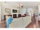 Comfortable living room featuring a fireplace, hardwood floors, and neutral decor at 3207 Oliver Stanley Trl, Lancaster, SC 29720