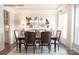 Formal dining room with crystal chandelier and dark wood furniture at 3539 Rapport Ct # 022, Lancaster, SC 29720