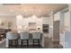 Modern kitchen with white cabinets, granite countertops, and a large island at 3539 Rapport Ct # 022, Lancaster, SC 29720