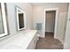 Modern bathroom with double vanity and walk-in shower at 3630 N Davidson St, Charlotte, NC 28205