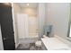 Clean bathroom with white subway tile, bathtub, and shower at 3630 N Davidson St, Charlotte, NC 28205