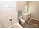 Bathroom with vanity, toilet and bathtub at 3630 N Davidson St, Charlotte, NC 28205