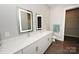 Modern bathroom with double vanity, large mirror, and separate tub and shower at 3630 N Davidson St, Charlotte, NC 28205