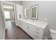 Modern bathroom with double vanity and walk-in shower at 3630 N Davidson St, Charlotte, NC 28205