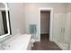 Bright bathroom with double vanity and walk-in shower at 3630 N Davidson St, Charlotte, NC 28205