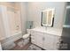 Modern bathroom with tub and vanity at 3630 N Davidson St, Charlotte, NC 28205