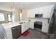 Modern kitchen with white cabinets and stainless steel appliances at 3630 N Davidson St, Charlotte, NC 28205