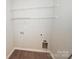 Laundry room with shelving and hookups at 3630 N Davidson St, Charlotte, NC 28205