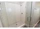 Clean subway tile shower with glass door at 3630 N Davidson St, Charlotte, NC 28205