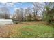 Spacious backyard with shed and partially fenced area at 412 N Vance St, Gastonia, NC 28052