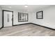 Bright living room with gray floors and black trim at 412 N Vance St, Gastonia, NC 28052