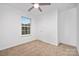 Empty bedroom with neutral carpeting, lots of light, and a large window at 4321 Bobterry Ct, Charlotte, NC 28216