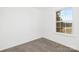 Simple bedroom with neutral carpet and a window at 4321 Bobterry Ct, Charlotte, NC 28216