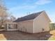 Back exterior view of house with a sunroom addition at 4321 Bobterry Ct, Charlotte, NC 28216