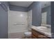 Updated bathroom with a tub, toilet, vanity, and mirror at 4335 Saluda Rd, Rock Hill, SC 29730