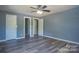 Spacious bedroom with gray walls and wood-look floors at 4335 Saluda Rd, Rock Hill, SC 29730