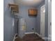 Small laundry room with water heater and shelving at 4335 Saluda Rd, Rock Hill, SC 29730