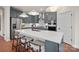 Gray kitchen cabinets, quartz countertops, and island at 4791 Formation Ct # 102, Lancaster, SC 29720