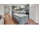 Gray kitchen cabinets, quartz countertops, and island at 4791 Formation Ct # 102, Lancaster, SC 29720