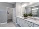 Modern bathroom with double vanity, large mirror, and elegant tile flooring at 4802 Formation Ct # 069, Lancaster, SC 29720