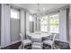 Bright dining room with a white table and chairs at 4802 Formation Ct # 069, Lancaster, SC 29720