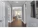 Elegant hallway with hardwood floors and views to multiple rooms at 4802 Formation Ct # 069, Lancaster, SC 29720