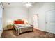 A bedroom featuring carpet, natural light, and neutral-painted walls at 4918 Sunset Ridge Ct, Charlotte, NC 28269