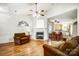 Cozy living room features hardwood floors, neutral colors, and a classic fireplace at 4918 Sunset Ridge Ct, Charlotte, NC 28269