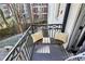 Balcony with bench seating, pillows, and decorative patterned tile at 4923 Park Rd # D, Charlotte, NC 28209