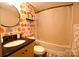 Bathroom with patterned walls and a tub shower combo at 4923 Park Rd # D, Charlotte, NC 28209