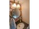 Charming bathroom with floral wallpaper and a granite countertop at 4923 Park Rd # D, Charlotte, NC 28209