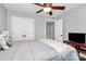 Bedroom with a double closet and a ceiling fan at 4923 Park Rd # D, Charlotte, NC 28209