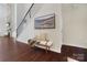 Light and bright entryway with hardwood floors and bench at 501 Alucio Ct, Matthews, NC 28104