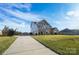 House with driveway and landscaped front yard at 501 Alucio Ct, Matthews, NC 28104