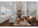 Living room with a stunning stone fireplace and high ceilings at 501 Alucio Ct, Matthews, NC 28104