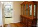 Dining room with hardwood floor and view into kitchen at 518 Oak St, Troy, NC 27371