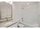 This is a clean bathroom featuring granite countertops, a large tub, and chrome hardware at 5812 Torrence St, Charlotte, NC 28269