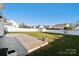 Large backyard with patio and grassy area at 6518 Afterglow Dr, Indian Trail, NC 28079