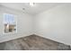 Bright bedroom with window and laminate flooring at 6518 Afterglow Dr, Indian Trail, NC 28079